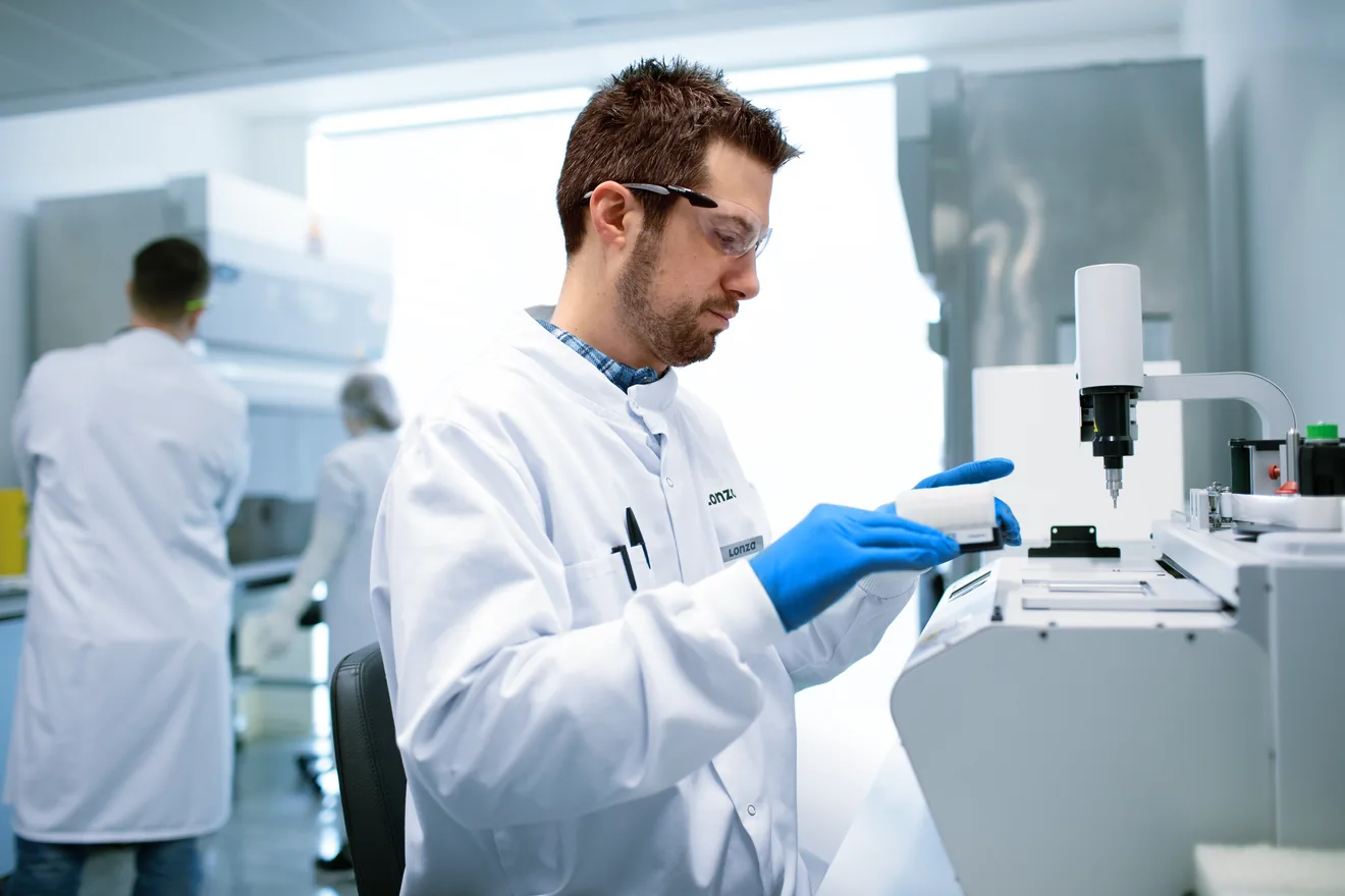 man working with microscope in lab,Process Development,Biologics_Slough_18,,lab in slough,tech working in lab with computer,male tech pipetting,tech holding vial,tech working,Cell Iine process development,biologics lab worker, ,Biologics_Slough_29,Biologics , Biologics Slough 