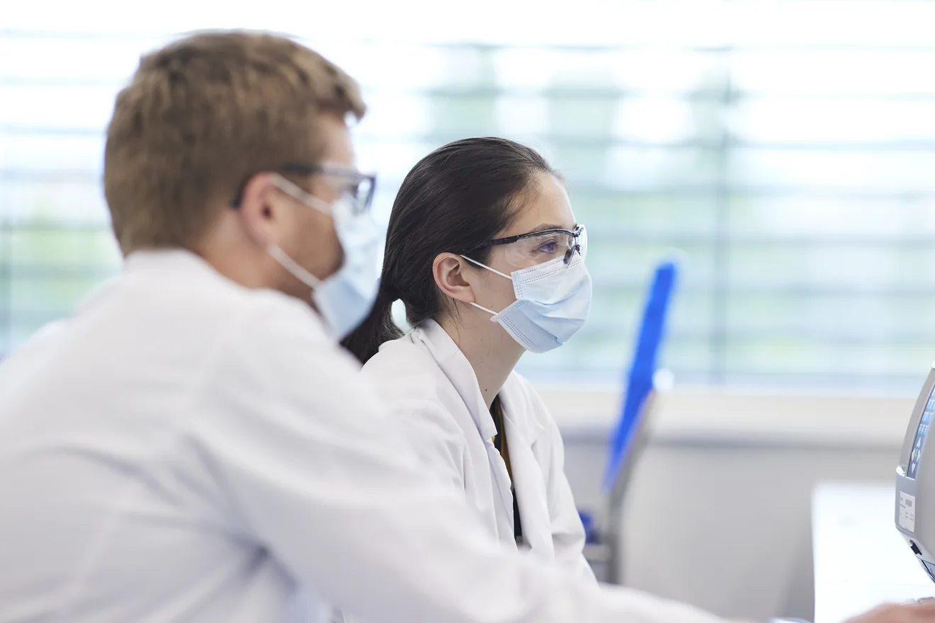 lab tech wearing masks