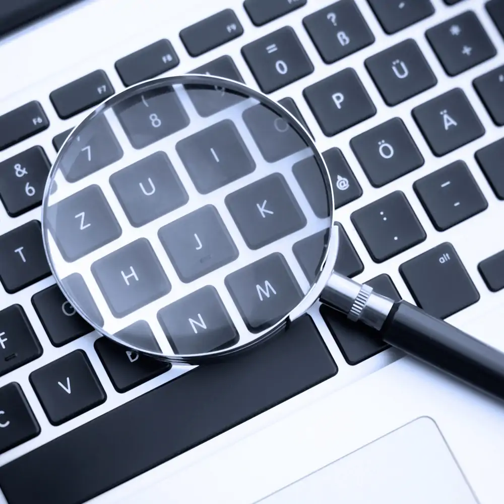 Magnifying glass over keyboard