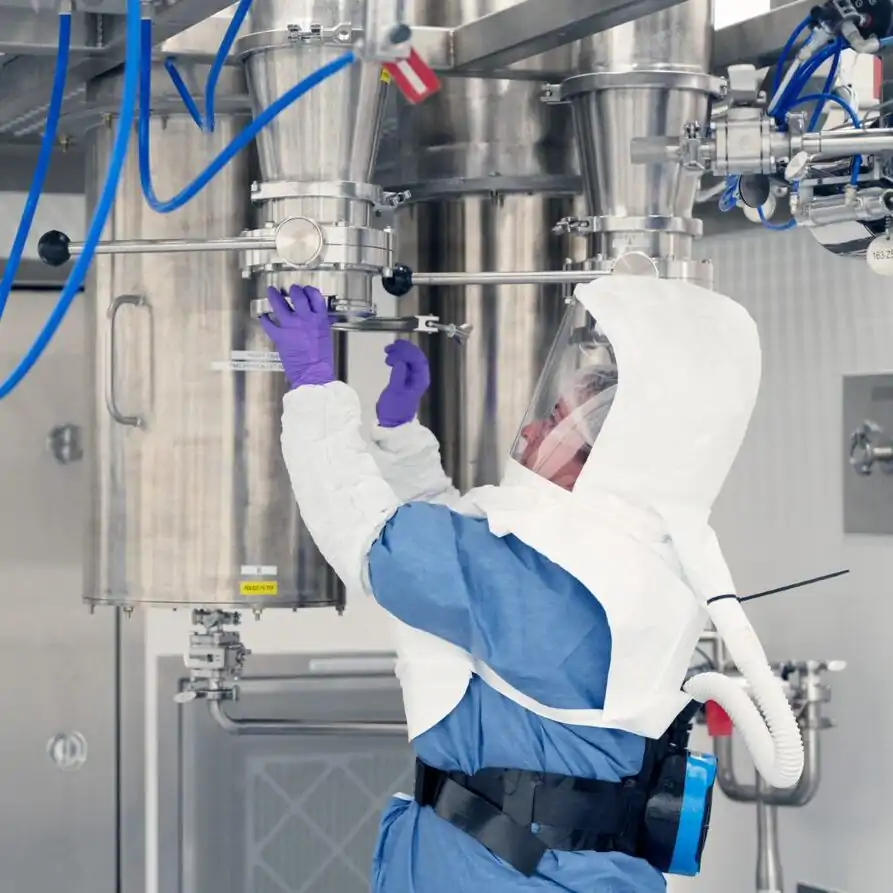 women working on spray dryer