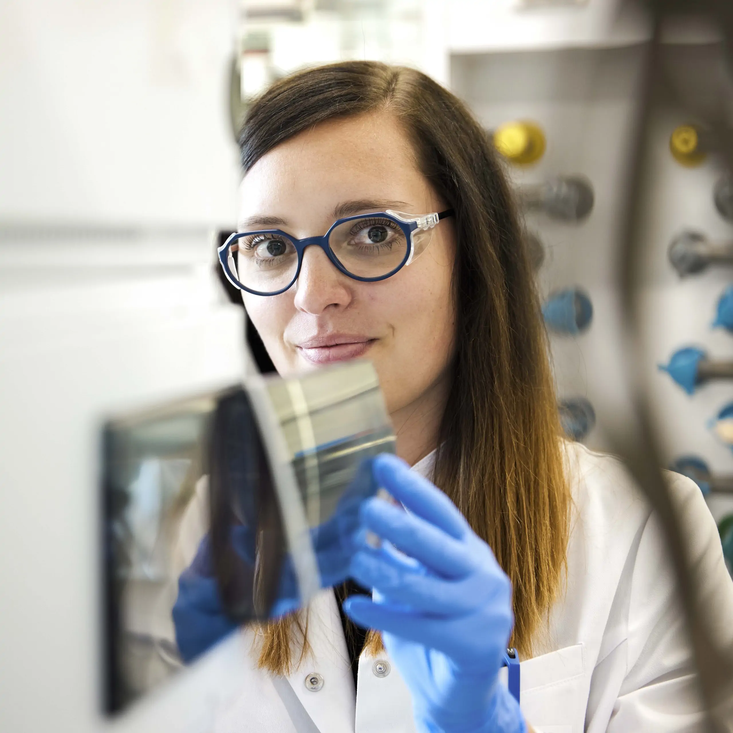 Visp employee in lab setting