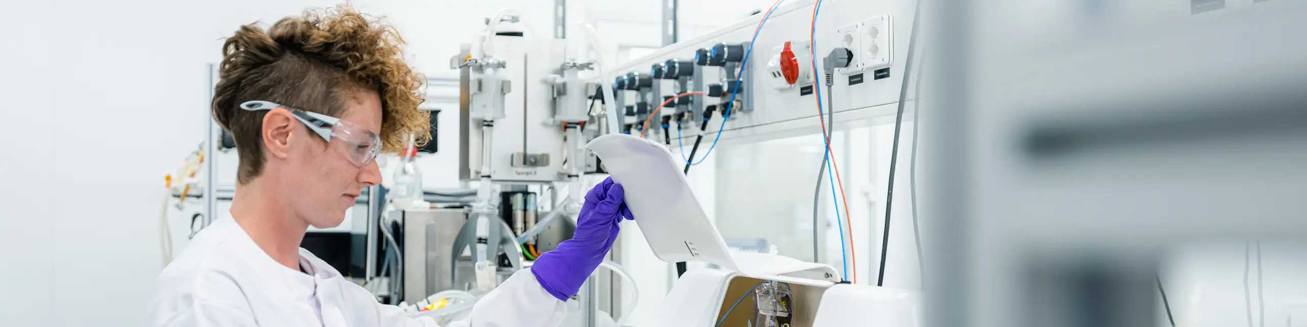 Worker in biologics lab