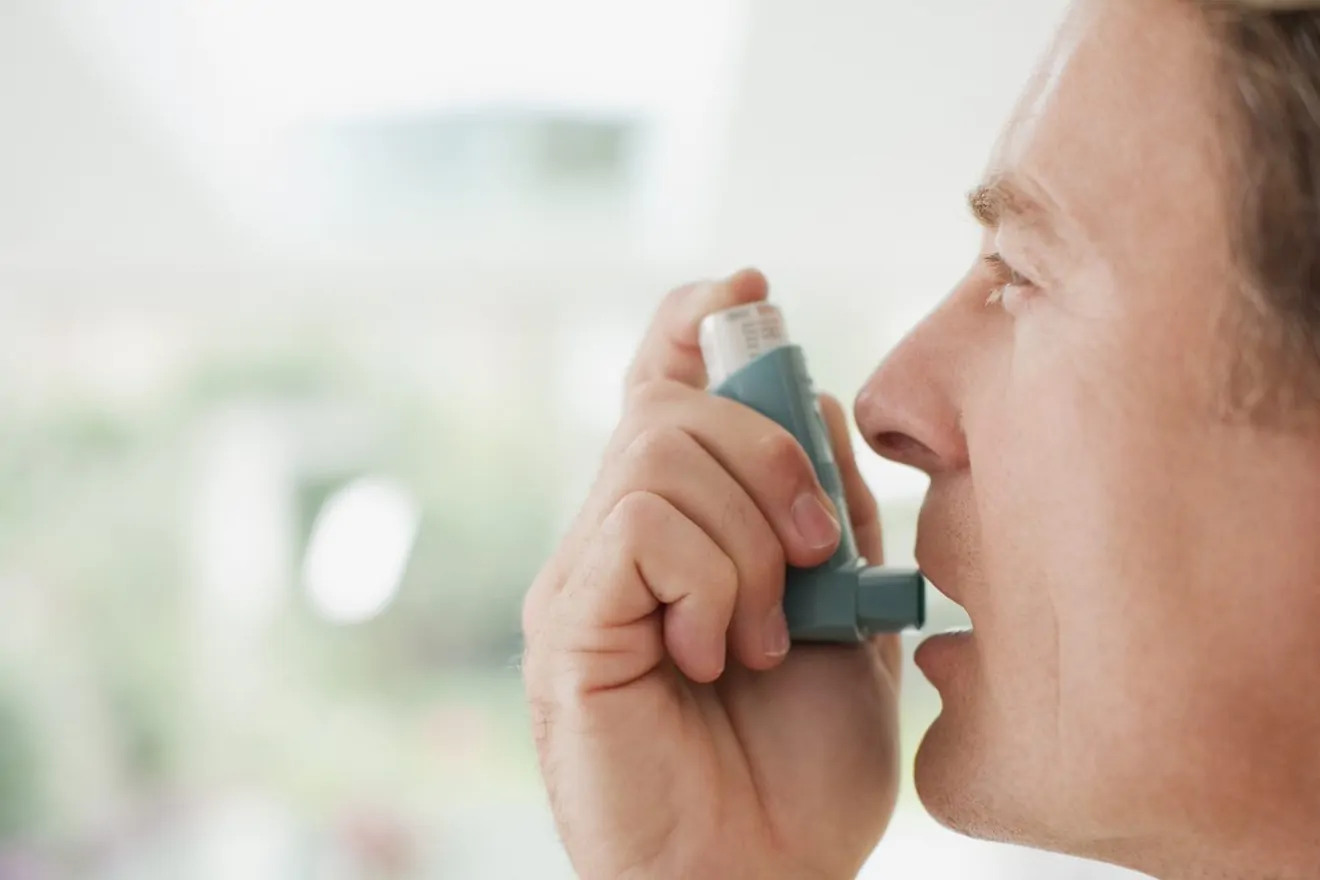 male using inhaler