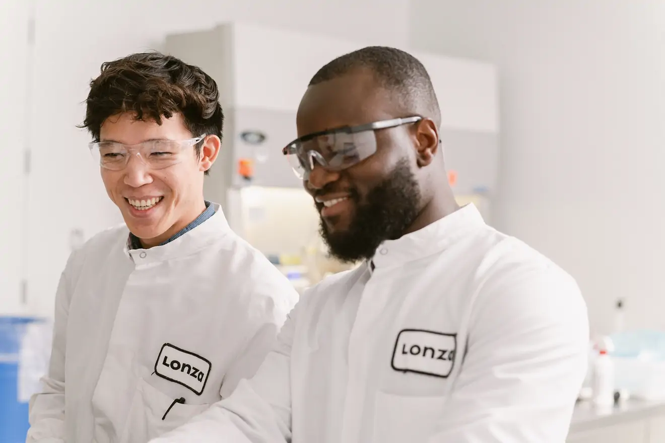 two men laughing in lab - iPSCs